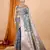 grey banarasi silk blend meenakari zari weaving saree with tassels on pallu