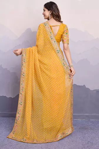 Yellow georgette bandhej saree