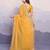 Yellow georgette bandhej saree