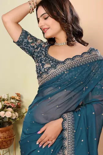 Teal blue organza embroidered saree