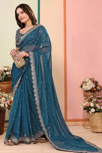 Teal blue organza embroidered saree