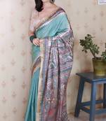 Green woven zari border digital printed tussar silk saree