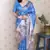 Woven zari border digital printed blue tussar silk saree