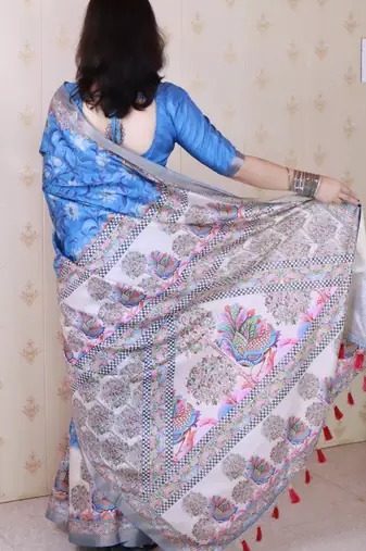 Woven zari border digital printed blue tussar silk blend saree