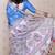 Woven zari border digital printed blue tussar silk saree