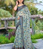 Green linen cotton woven border printed saree