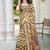 Brown printed saree with woven border