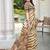 Brown printed saree with woven border
