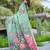 Green printed saree with woven border