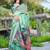 Green printed saree with woven border