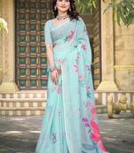 Sea green printed saree with woven border