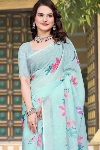 Sea green printed saree with woven border