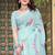 Sea green printed saree with woven border