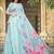 Sea green printed saree with woven border