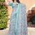Sea green printed saree with woven border