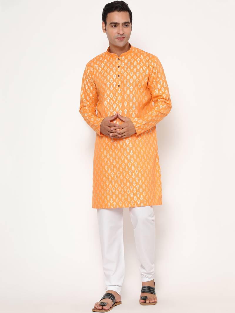 Men's festive orange printed kurta with white churidar
