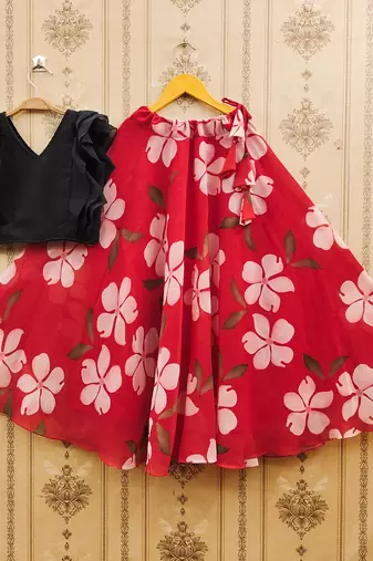 Black printed faux georgette lehenga and choli for girls