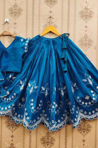 Turquoise embroidered taffeta lehenga and choli for girls