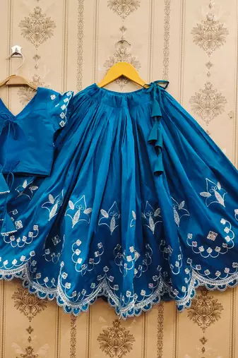 Turquoise embroidered taffeta lehenga and choli for girls