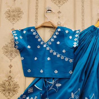 Turquoise embroidered taffeta lehenga and choli for girls 2