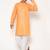 Men's festive orange printed kurta with white churidar