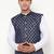 Elegant navy blue nehru jacket with golden floral motif accents.