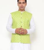 green nehru jacket with golden floral motif accents.