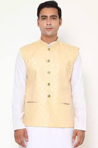 Elegant yellow nehru jacket with golden floral motif accents.