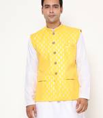 lemin yellow nehru jacket with golden floral motif accents.
