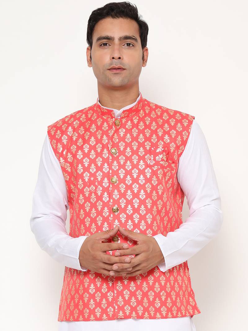 Elegant peach nehru jacket with golden floral motif accents.