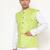 Elegant green nehru jacket with golden floral motif accents.