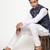 Elegant navy blue nehru jacket with golden floral motif accents.
