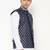 Elegant navy blue nehru jacket with golden floral motif accents.