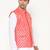 Elegant peach nehru jacket with golden floral motif accents.