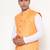 Elegant orange nehru jacket with golden floral motif accents.
