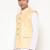 Elegant yellow nehru jacket with golden floral motif accents.
