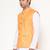 Elegant orange nehru jacket with golden floral motif accents.