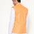 Elegant orange nehru jacket with golden floral motif accents.