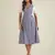 Lavender solid pinafore dress with button