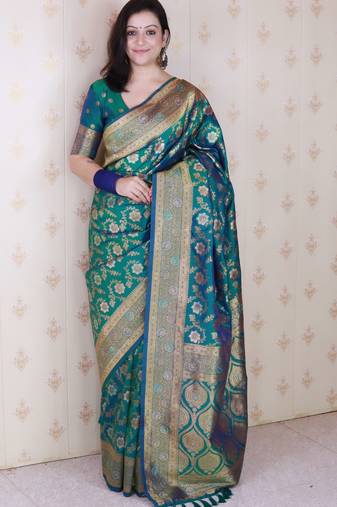 green banarasi jaal silk blend gold zari meenakari woven saree