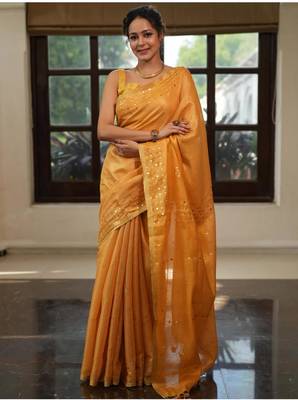 Mustard orange handwoven tissue linen saree with mirror work 1