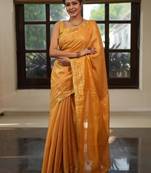 Mustard orange handwoven tissue linen saree with mirror work