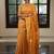 Mustard orange handwoven tissue linen saree with mirror work