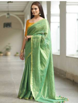 handwoven green tissue linen saree with mirror work 1