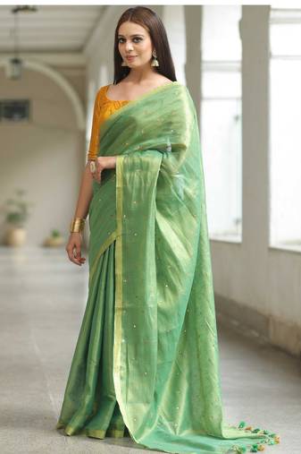 handwoven green tissue linen saree with mirror work