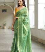 handwoven green tissue linen saree with mirror work