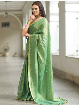handwoven green tissue linen saree with mirror work 2