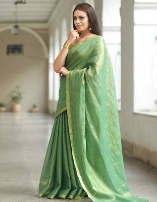 handwoven green tissue linen saree with mirror work 3