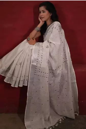 handwoven white linen saree with mirror work