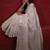 handwoven white linen saree with mirror work